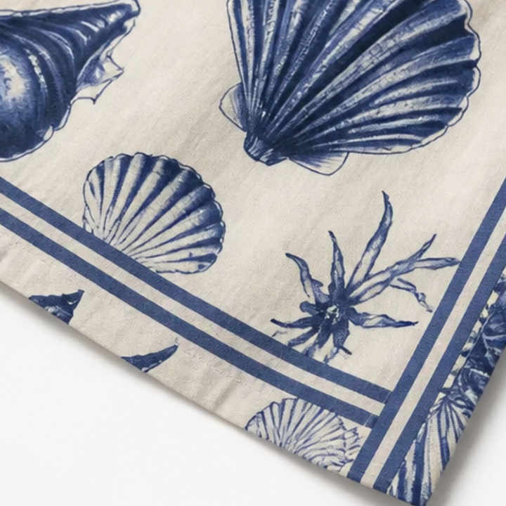 Shellini™ – Coastal Shell Print Wrap Romper