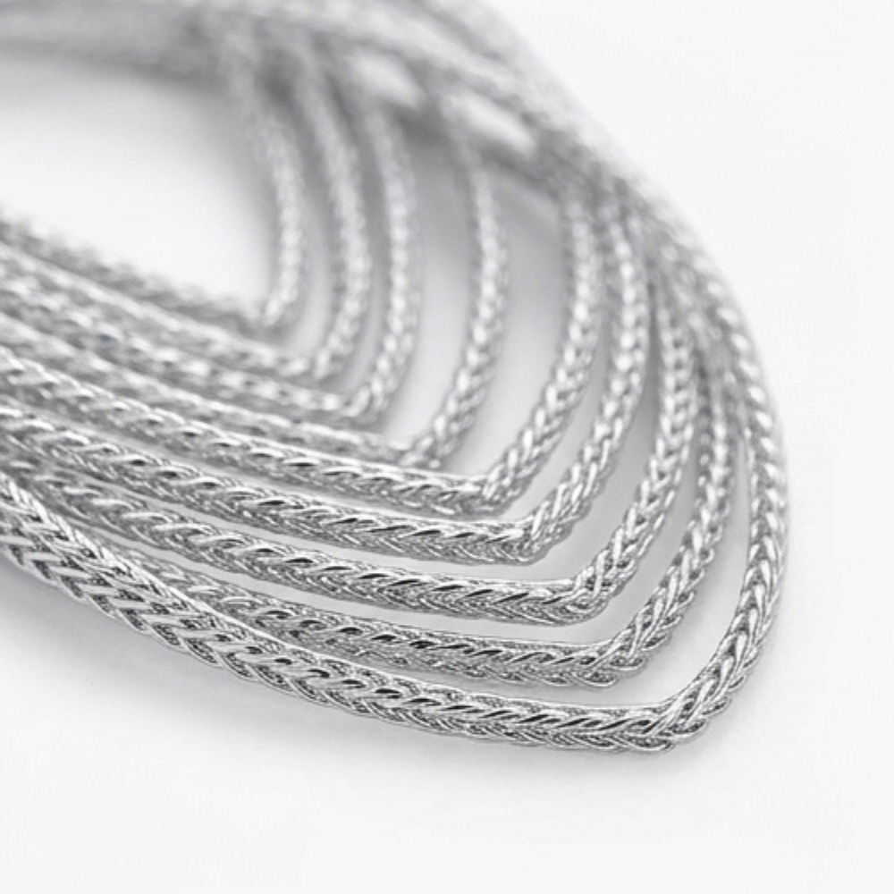 Lumivra™ – Cascading Silver Leaf Earrings