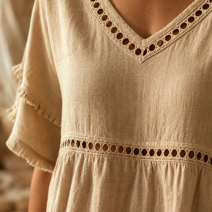 Meloria – Bohemian Babydoll Top with Eyelet Cutouts and Fringe Hem