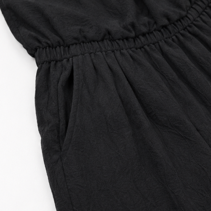 Draplyn – The Halter Jumpsuit That Skims, Not Swallows