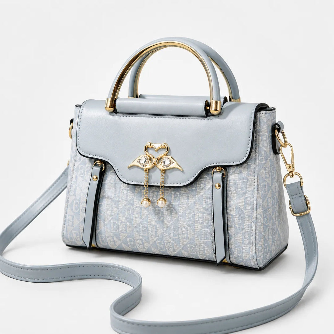 Velora – Swan-Clasp Structured Crossbody Bag with Gold Hardware