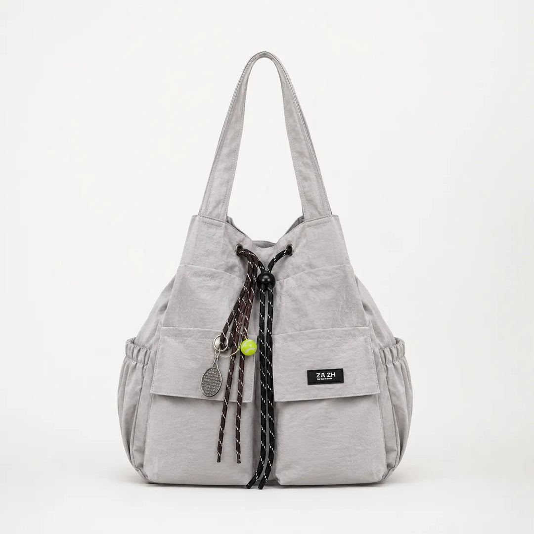 Carryall – Convertible Drawstring Canvas Tote Backpack with Cargo Pockets