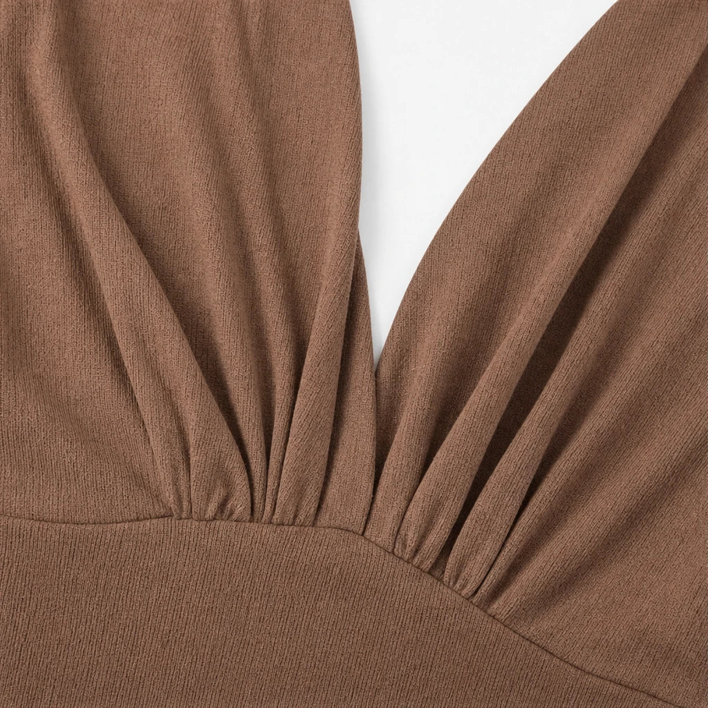 Vela Rue – Ruched Plunging V-Neck Bell Sleeve Top