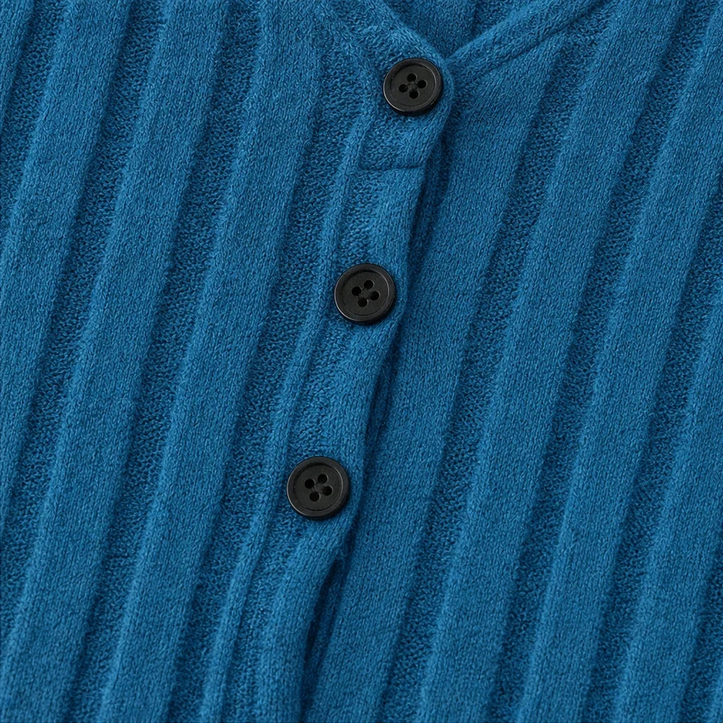 Vellora – Ribbed V-Neck Peplum Top