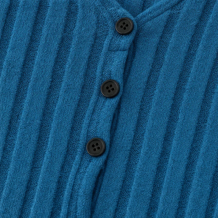 Vellora – Ribbed V-Neck Peplum Top