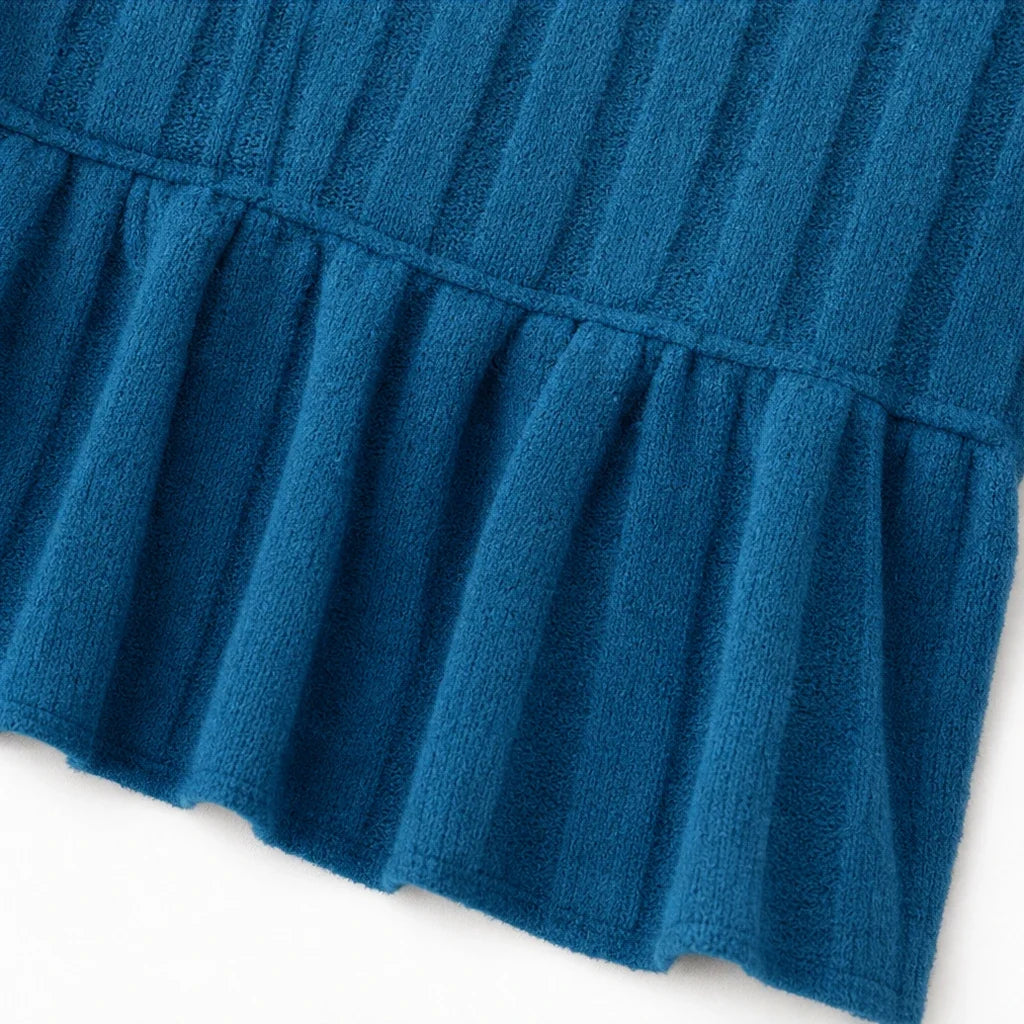 Vellora – Ribbed V-Neck Peplum Top