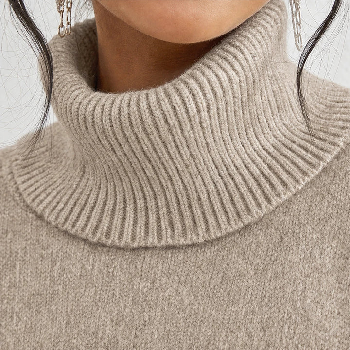 Avenza – Oversized Asymmetrical Turtleneck Sweater