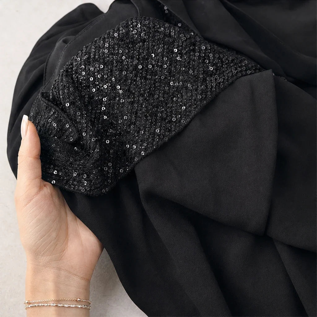 Vellora – Sequin Ruffle V-Neck Blouse