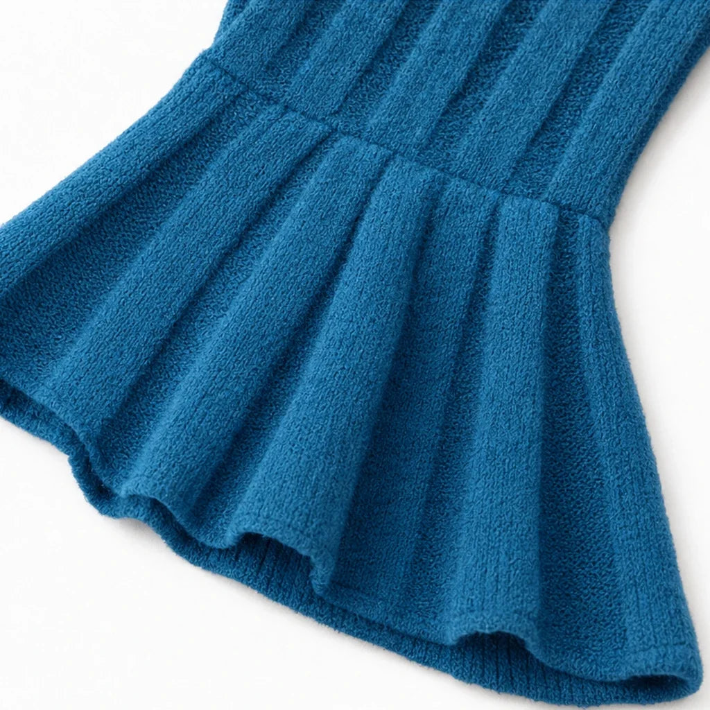 Vellora – Ribbed V-Neck Peplum Top