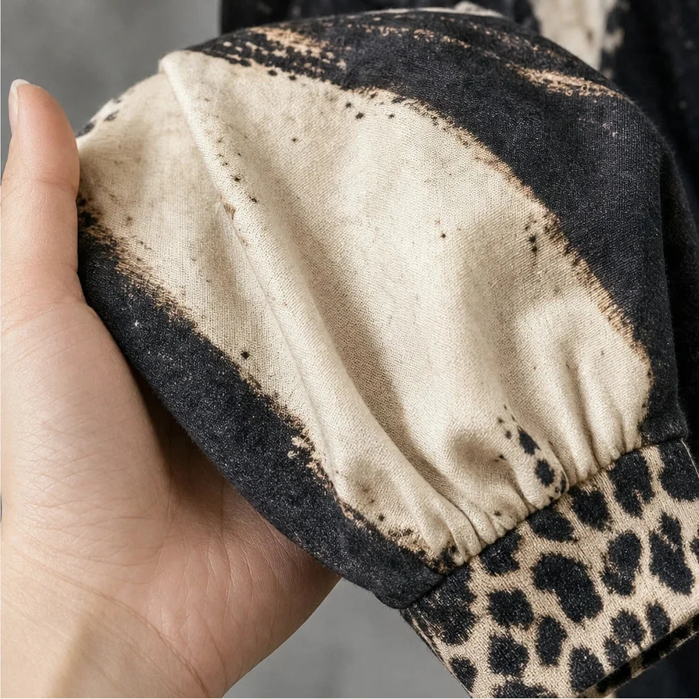 Leopard Swing – Leopard Print Fringe Hem Sweater Dress
