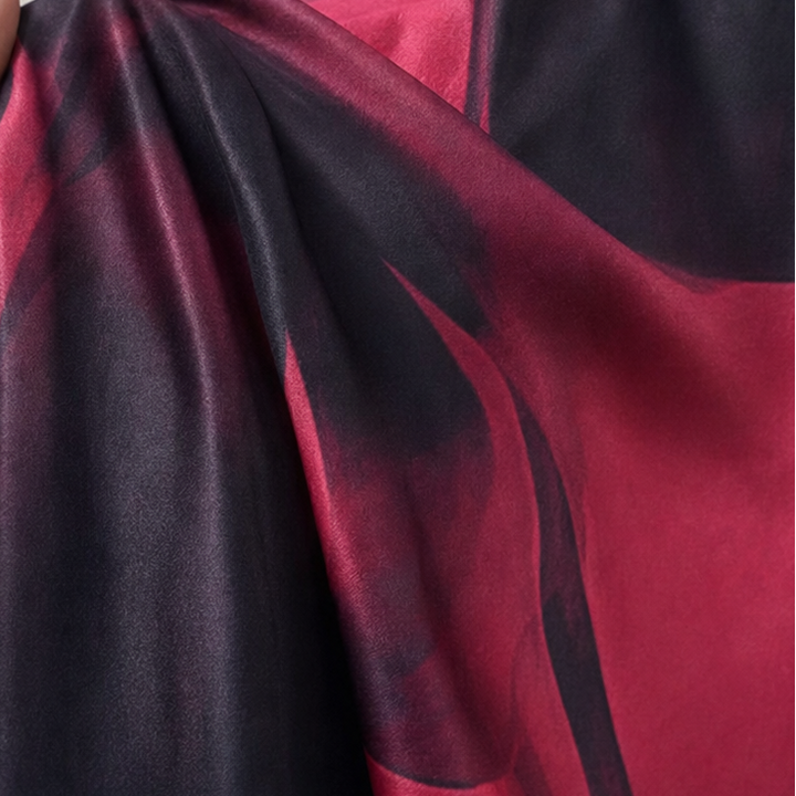 Vellora – Abstract Print Wrap Midi Dress