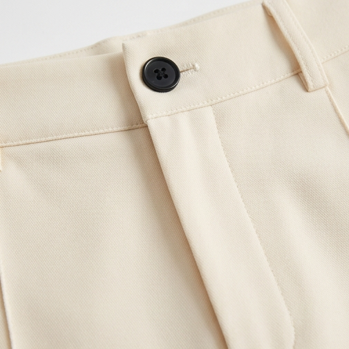 Veloura – High-Waisted Pleated Stretch Trousers