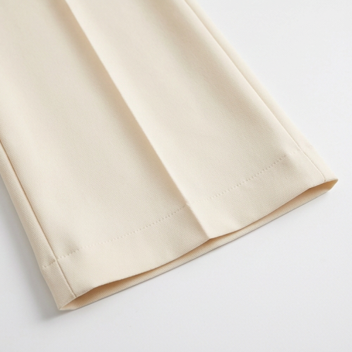 Veloura – High-Waisted Pleated Stretch Trousers