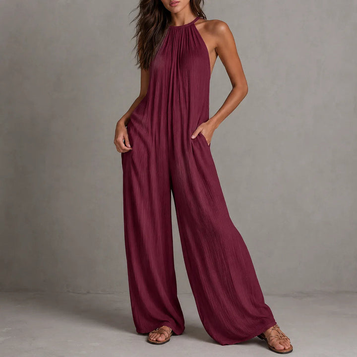Drevana – Halter Wide-Leg Jumpsuit with Deep Pockets, Flowy Drape