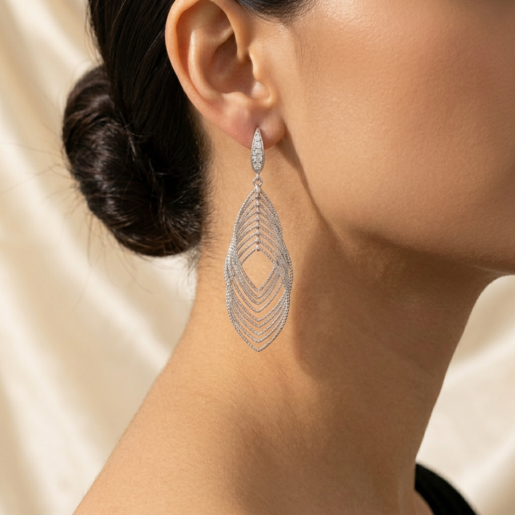 Lumivra™ – Cascading Silver Leaf Earrings