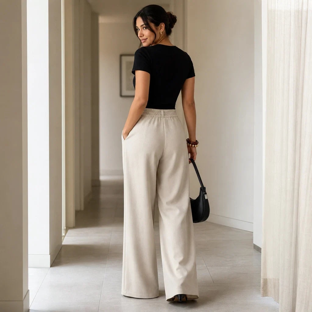 Veloura – High-Waisted Pleated Wide-Leg Trousers