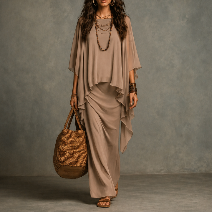 Draperie – Cape Sleeve Asymmetric Hem Maxi Dress